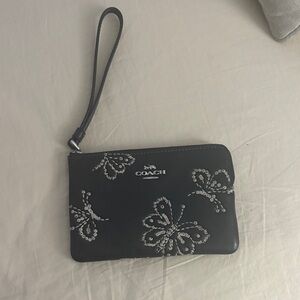 Coach Black Wristlet with Silver Floral Accents